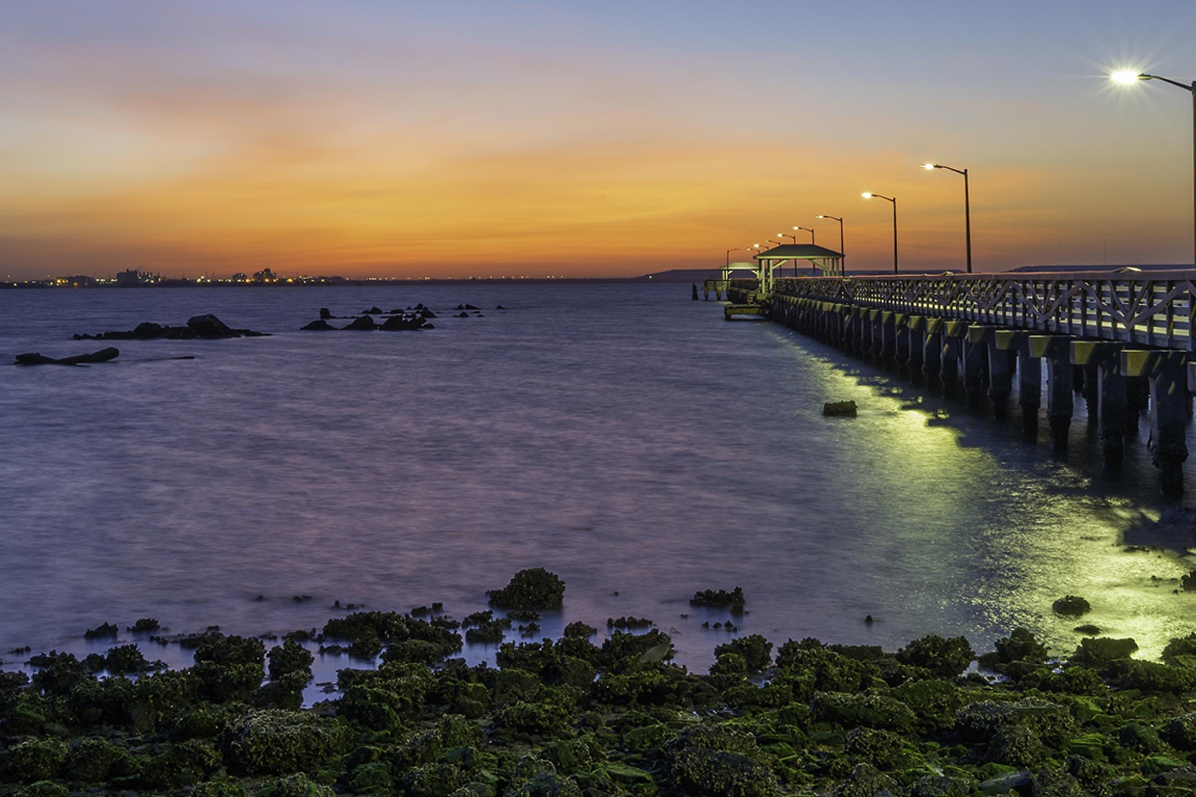 Fishing pier at Ballast Point Park at sunset